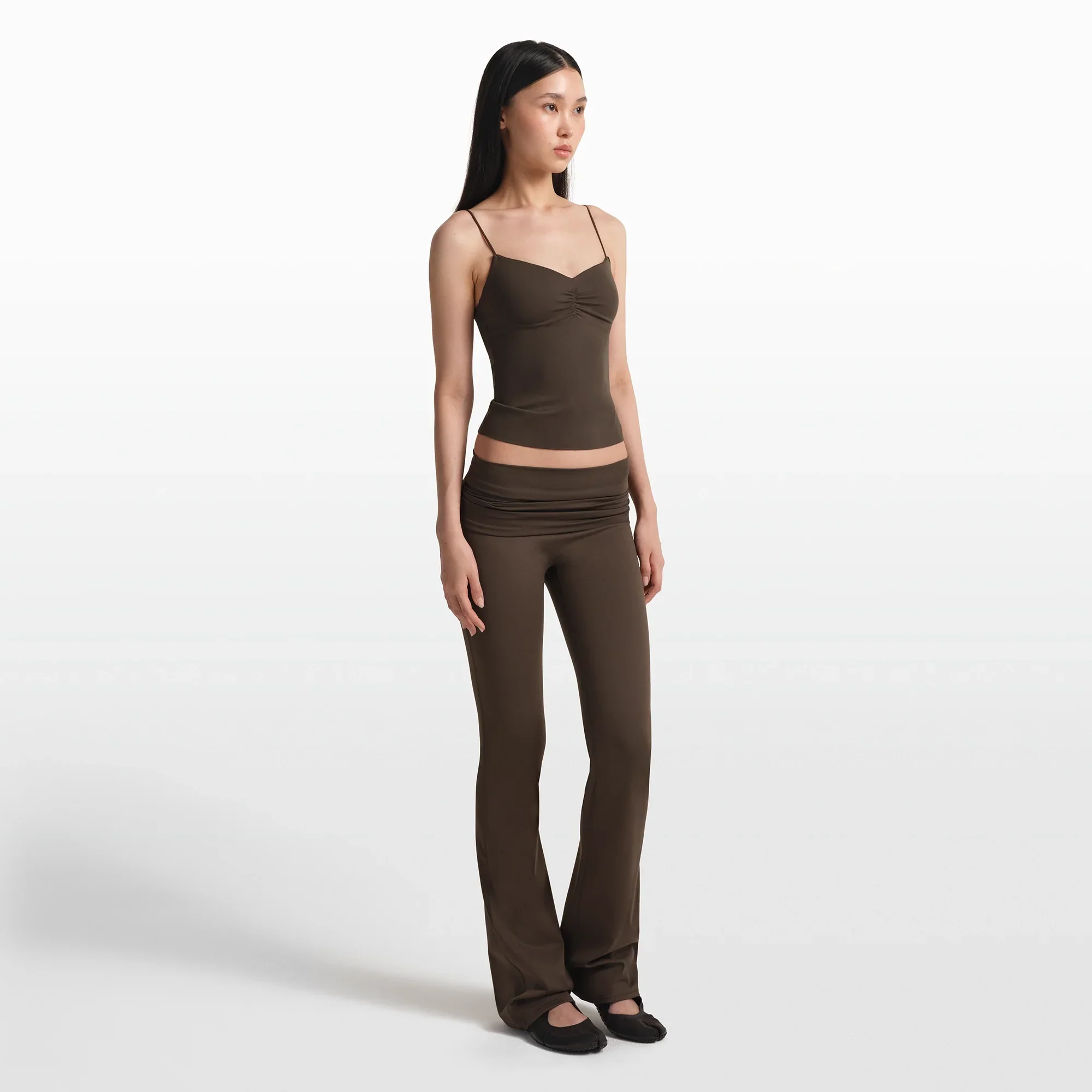 NikeSKIMS MATTE FOLDOVER SLIM FLARE LEGGING | DARK SEPIA - Image 2